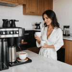 Casual elegance: MILF in short robe, savoring her morning coffee.